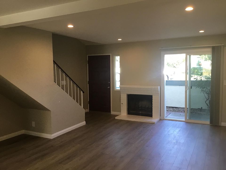 Living room view toward front door
