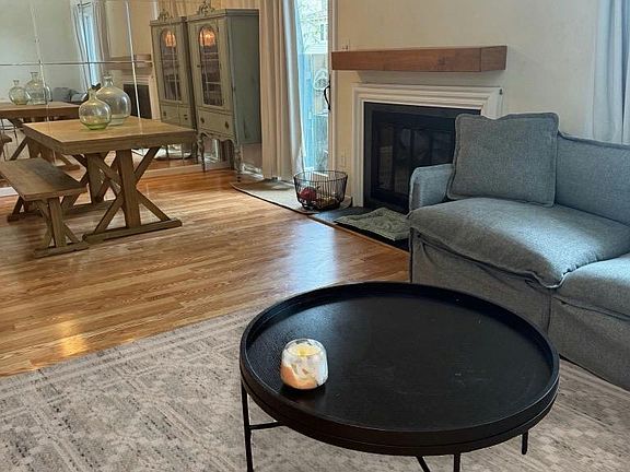 TV room and Dining Room with Fireplace (new paint)