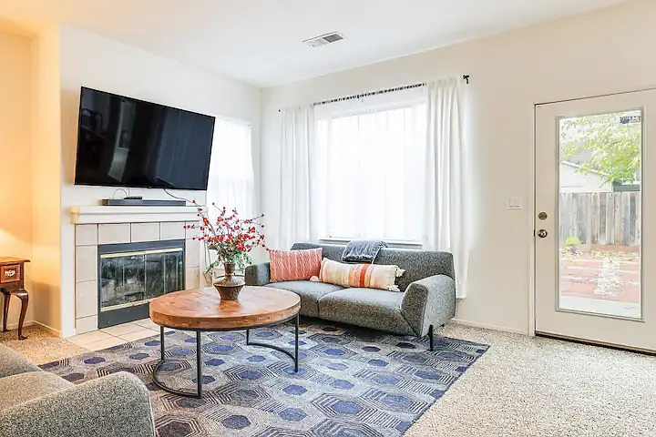 Second living area with entrance door to the backyard