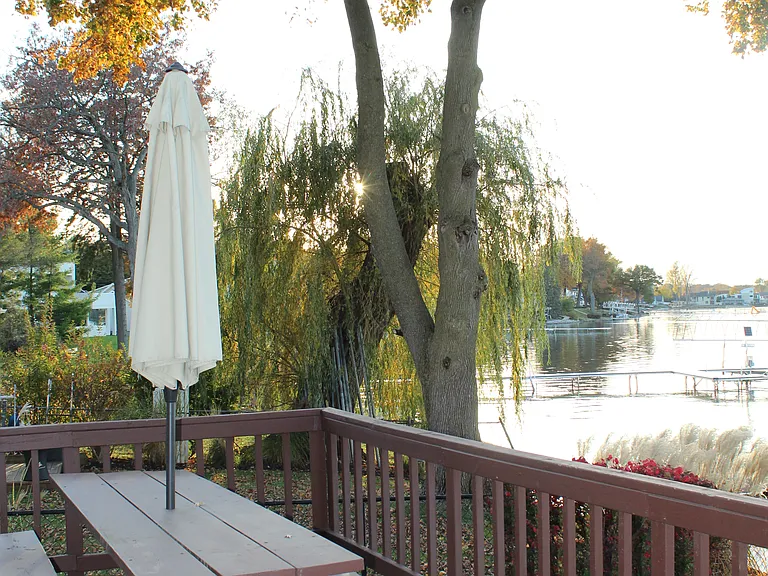 Large lakeside deck with picnic table