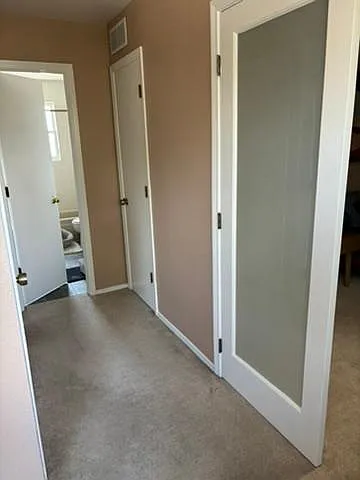 Upstair hallway (double door to master, two linen closets, 2nd bedroom/full bathroom)