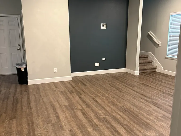 view from master bedroom into living room