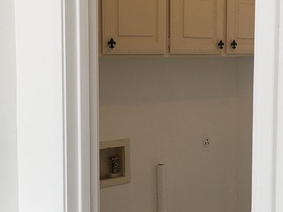 Laundry room within garage