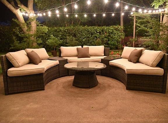 Back patio and seating at night
