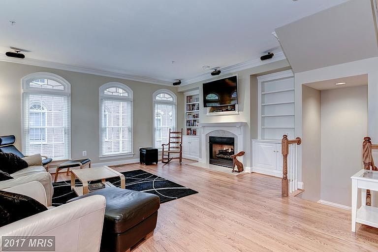 fireplace with built-in bookcases