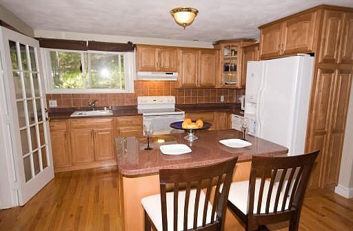 Kitchen with granite counter and breakfast island