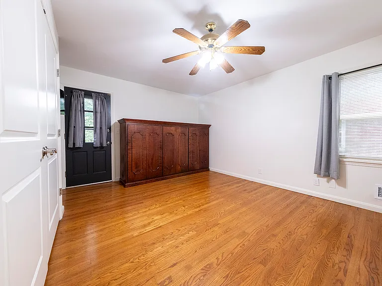 1st floor bedroom has access to backyard.