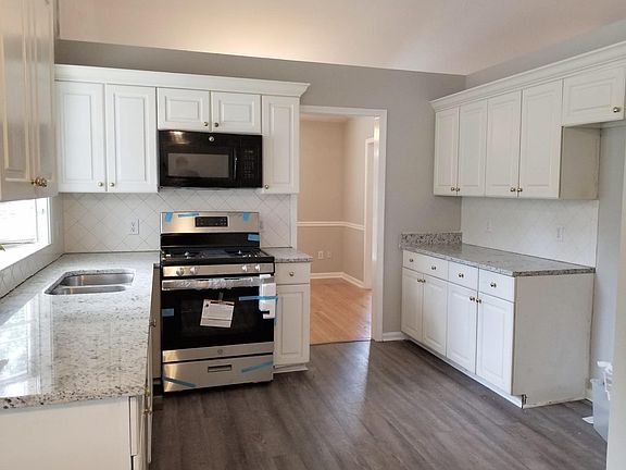 Kitchen with new granite countertops