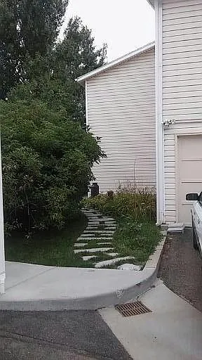 Our garage and private granite to the front door
