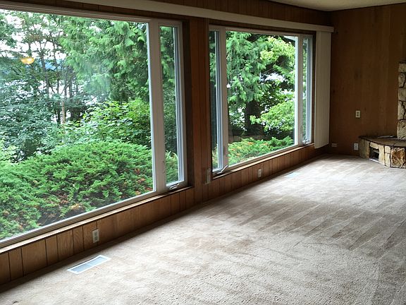 Huge Bay Windows Open to Water Views