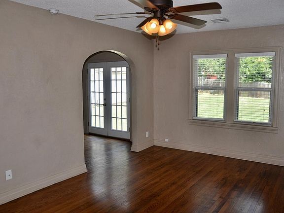 View of dining room from living - also view of the backyard