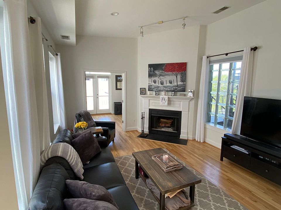 Main living area with second bedroom / office in the back.