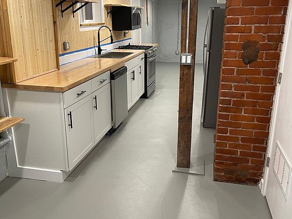 Funky old wooden beams and exposed brick chimney