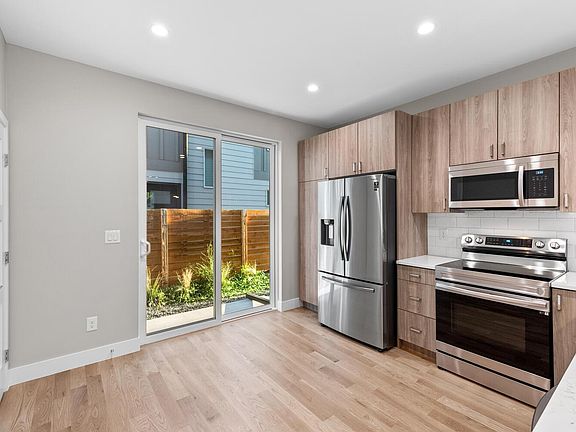 Kitchen, view of small backyard
