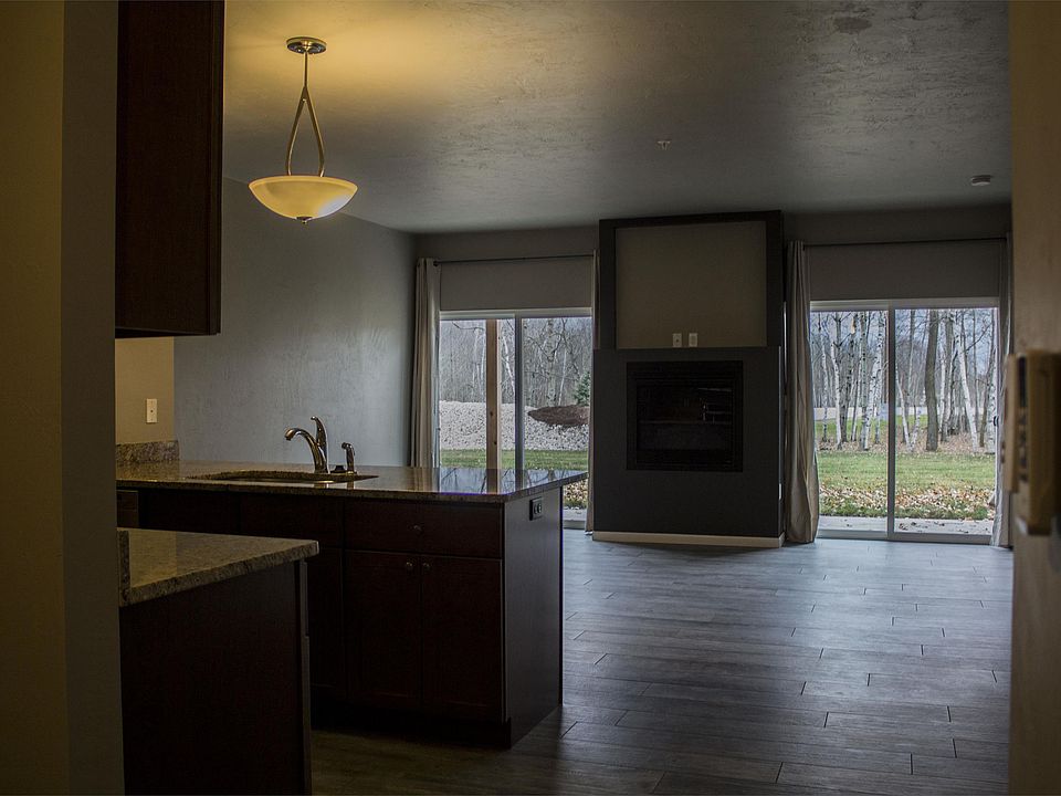 Kitchen, fireplace & private patio view