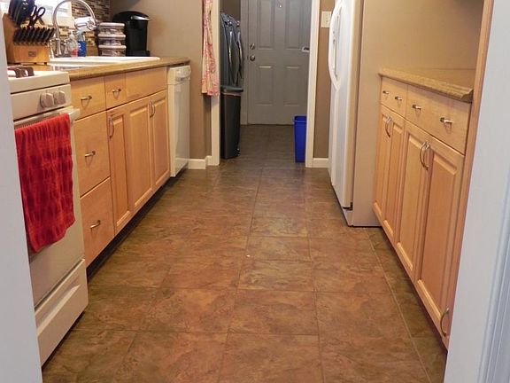 galley kitchen/ view from dining area