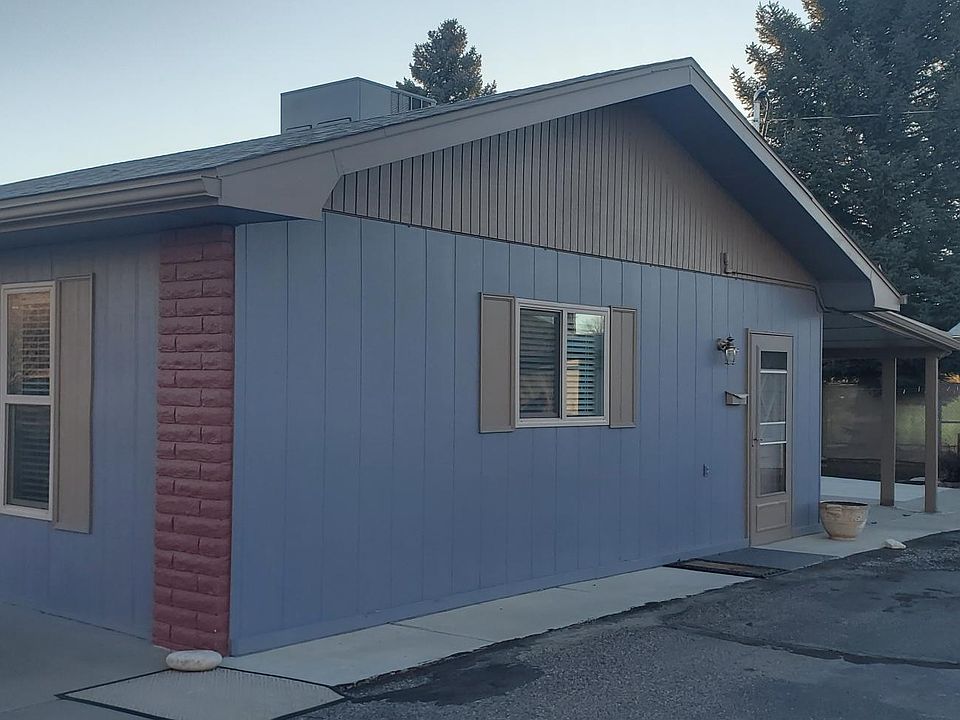North entrance showing adjacent carport