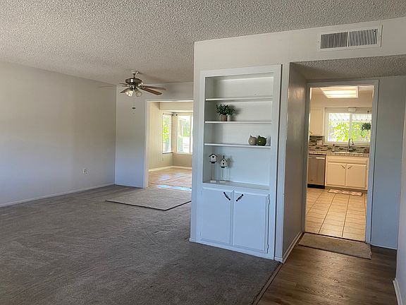Livingroom looking to Kitchen and Den