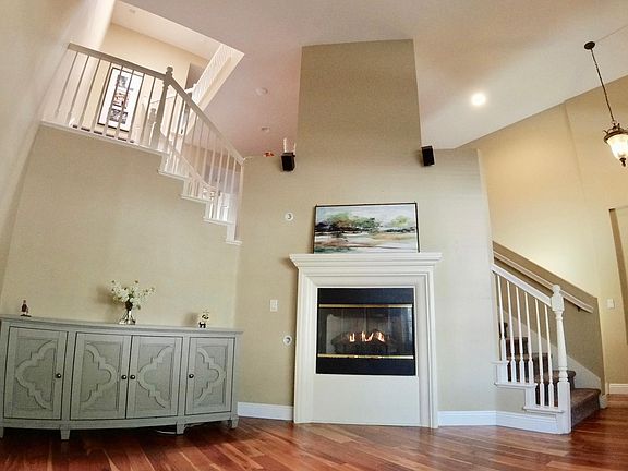 Ground floor living room with gas fireplace.