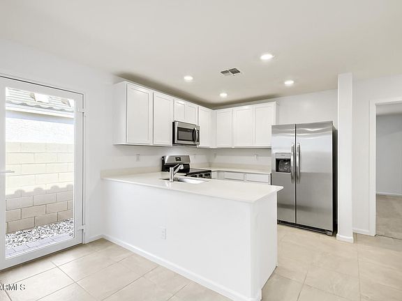 4th image of 36118 W CHARITY Place