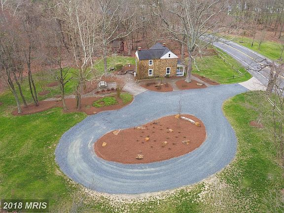 Aerial view. 4  Acres-Extensive landscaping