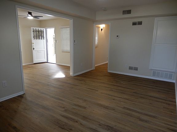 Living room looking into dining room.