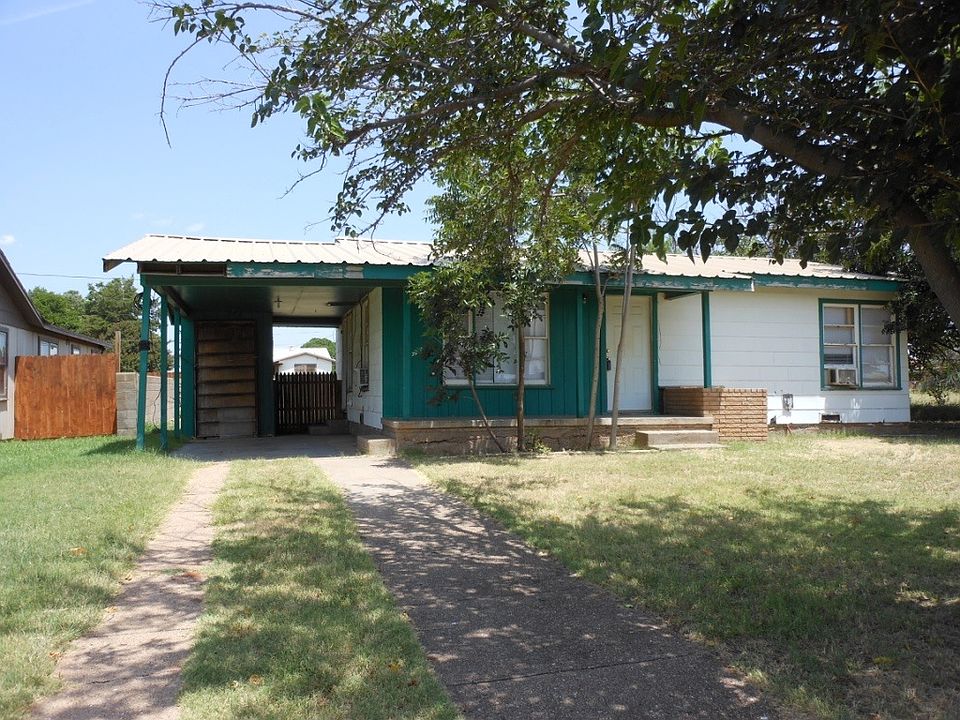 Front view with carport