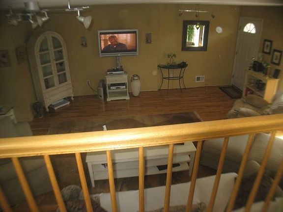 looking down from family room onto living room