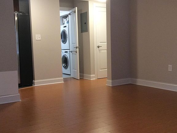 Living room towards bathroom and hallway
