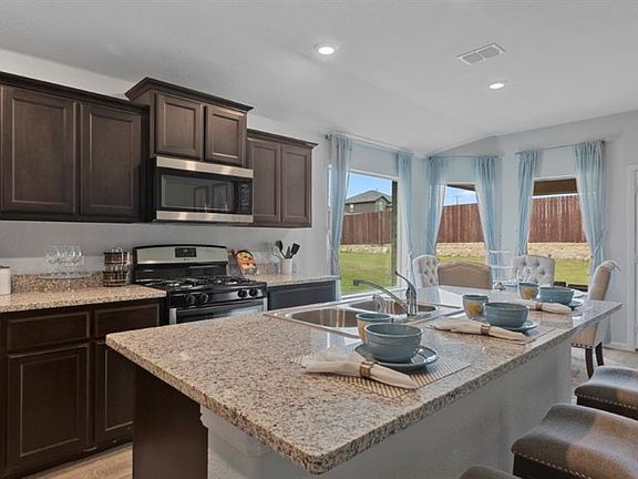 All photos shown here may not depict the specified home & features included are for illustration purposes only.