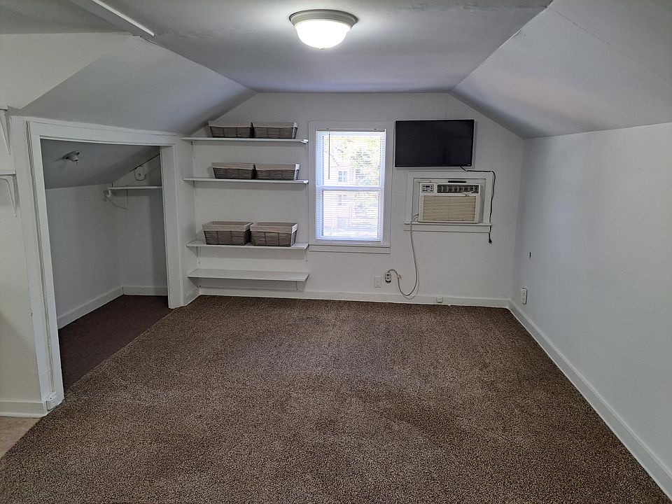 Living area. Great shelving for storage. Large closet space.