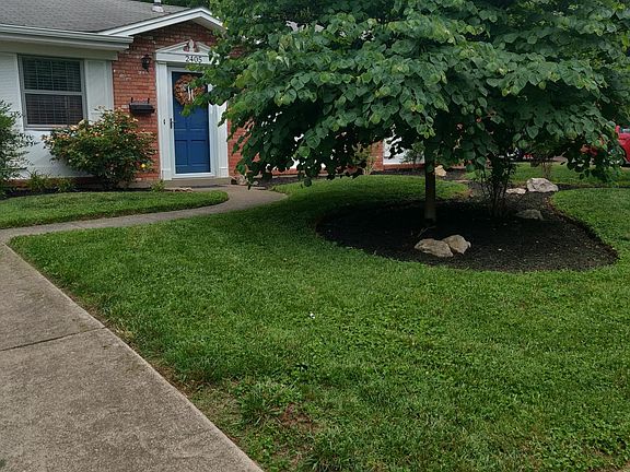 Double driveway and beautiful landscaping
