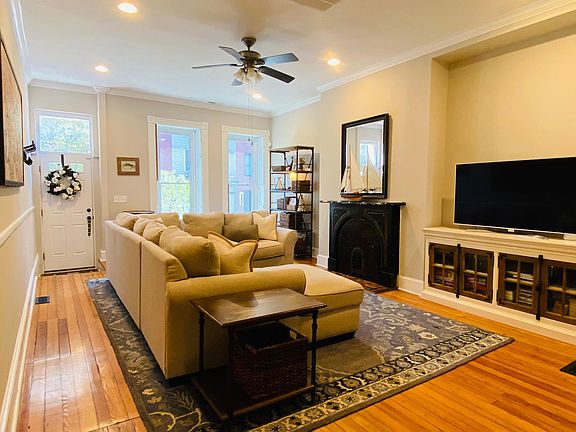 Bright and open living room with 10ft ceilings
