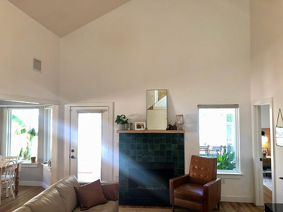 recently redone fireplace: Cle tile High quality Bali window shades