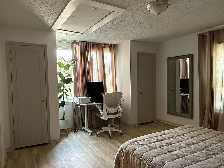 Second-floor master bedroom with 3 closets