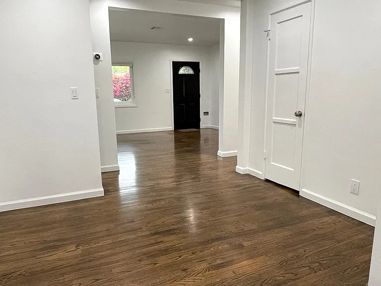 view from den (great for office, gym or kids play area) toward the front door.