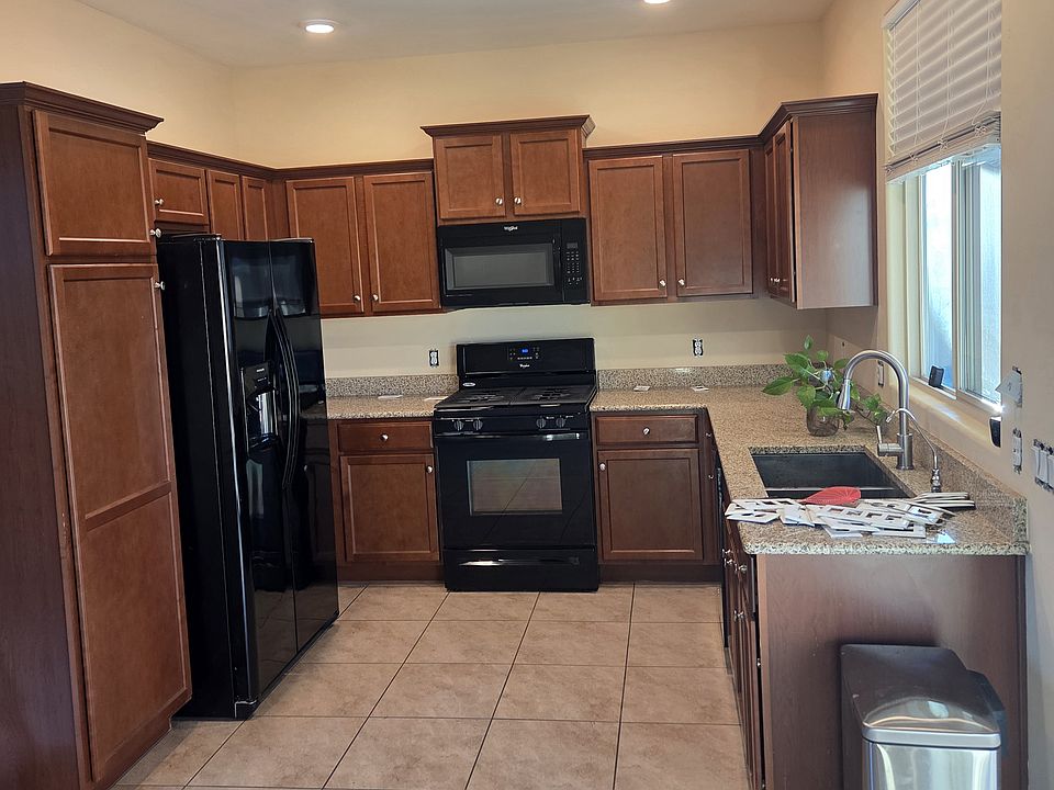 1st image of 6673 E 35th Pl