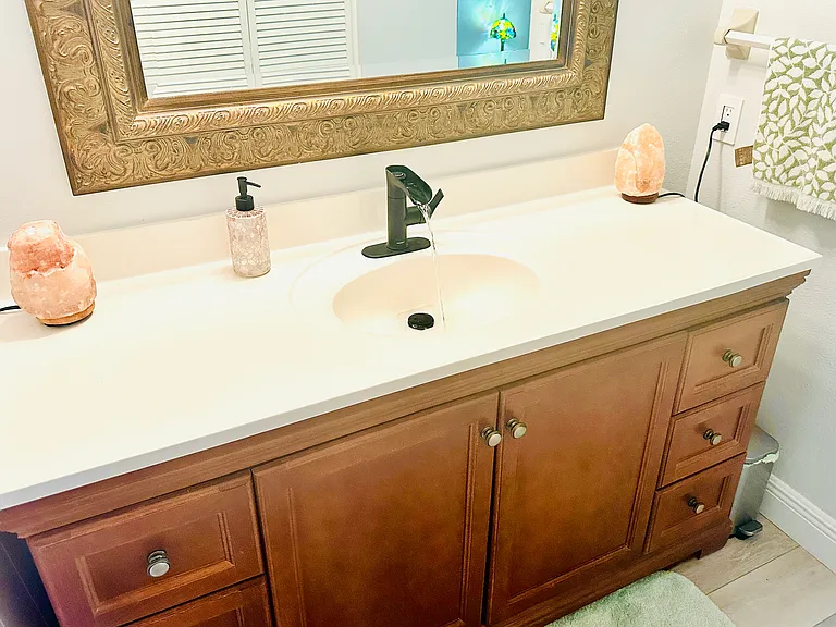Primary bath vanity with lots of drawers.