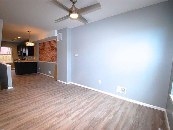 Large living area with new ceiling fan