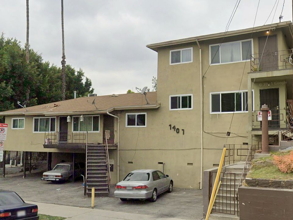 Parking spot is conveniently located to the left of the stairs directly up to your home.