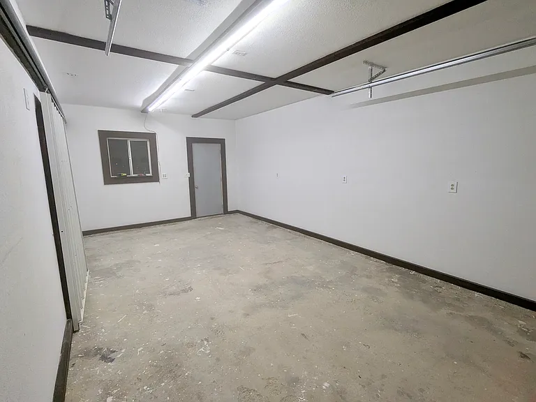 Garage includes second rear entry.