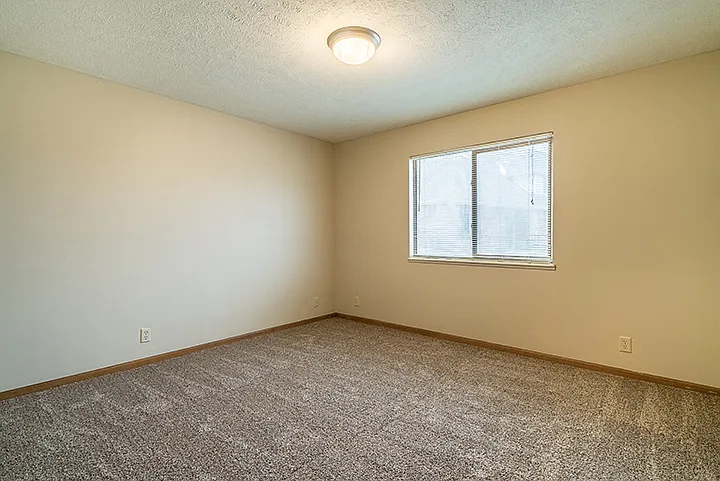 Wake up refreshed in your spacious, sunlit bedroom.