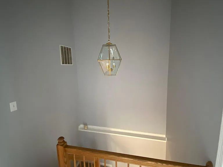2nd floor stairs leading to first floor