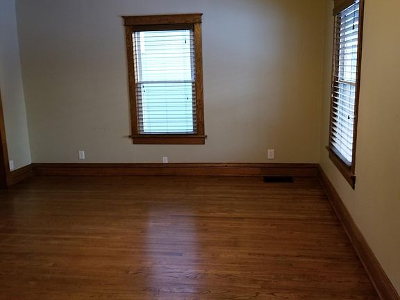 Living room just inside front door toward Dining Room Archway - Good size living room and if you put your table in kitchen could be L shape living space.