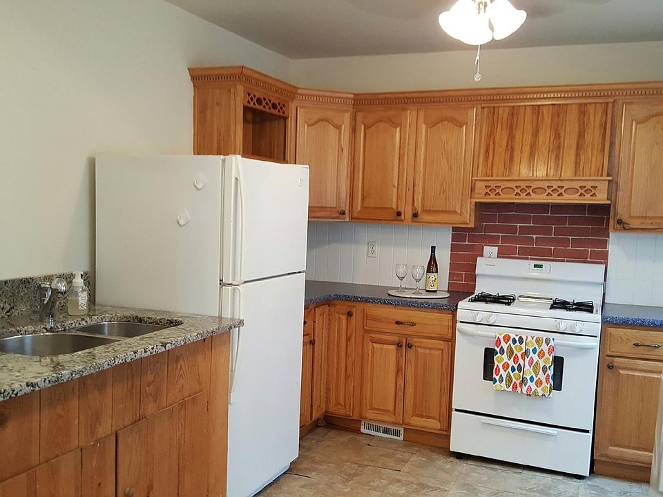Bright, sunny Kitchen with full sized Washer and Dryer.