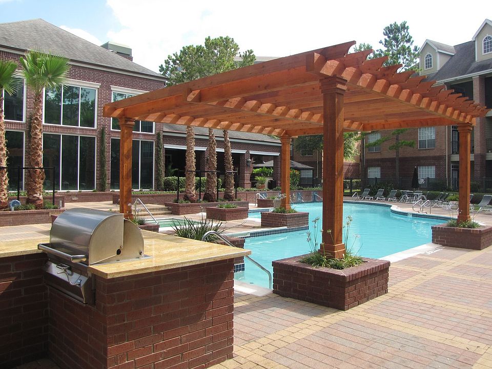 Two gas grills and a lounging deck provide a great relaxing atmosphere.