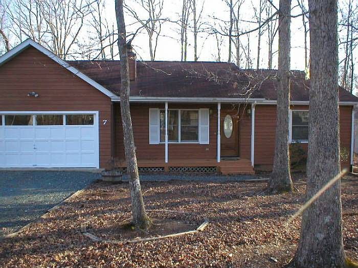 Level yard, mature trees