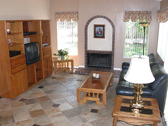 Living room with custom tile slate flooring