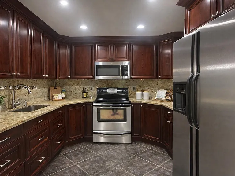 3933 Cocoplum Cir #3518 — Photo 2