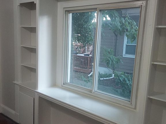 Dinning room window and built in shelves